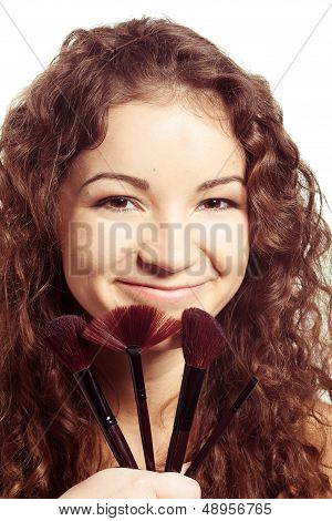 woman is making make-up