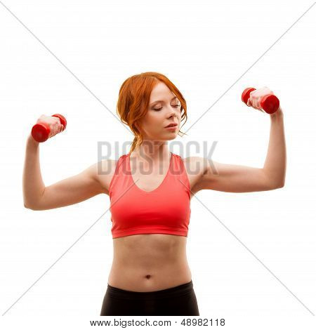 woman exercising with dumbbells
