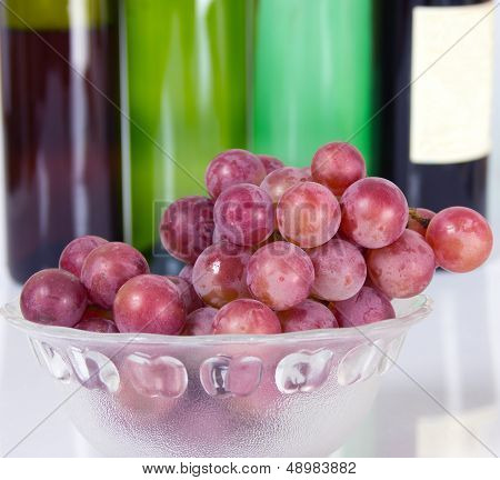 Grapes And Red Wine Bottle