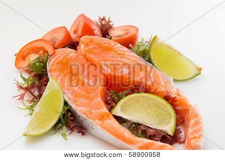 Raw Salmon Fillet With Vegetables On White Background
