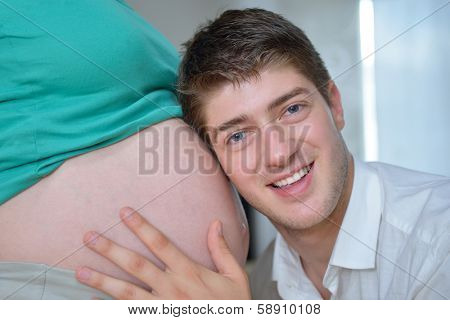 happy young cuple, pregnant woman