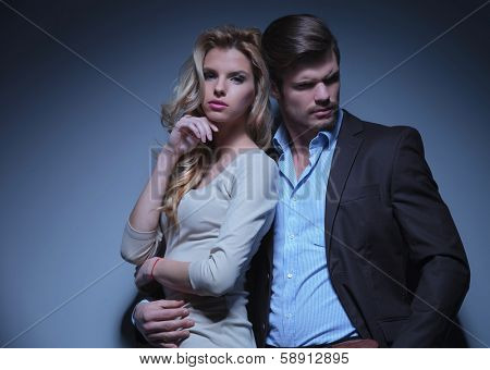 Stylish Man and Luxurious Woman. Luxurious Fashion Couple posing in studio