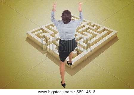 Businesswoman gesturing against yellow puzzle