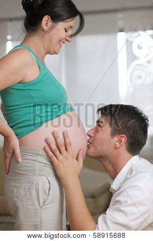 happy young cuple, pregnant woman