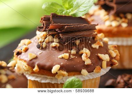 detail of one muffing with chocolate and nuts