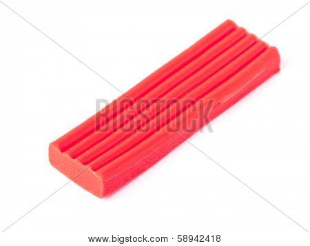 Single bar of plasticine isolated on white background