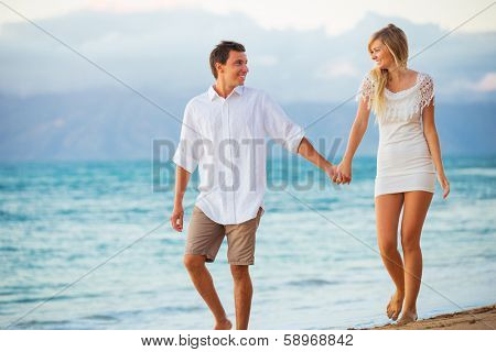 Romantic Couple Enjoying Sunset on Beautiful Tropical Beach