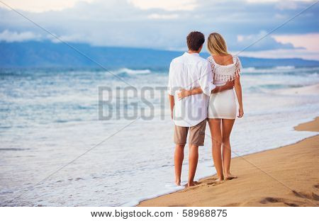 Romantic Couple Enjoying Sunset on Beautiful Tropical Beach