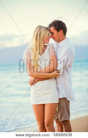 Romantic Couple Enjoying Sunset on Beautiful Tropical Beach