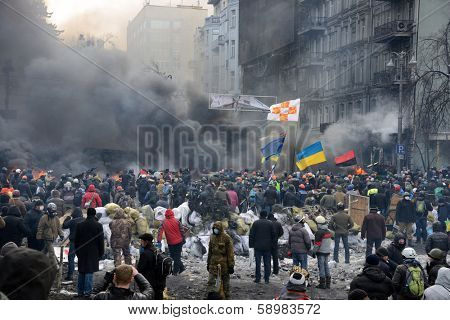 KIEV, UKRAINE - JANUARY 23, 2014: Anti-government protest in Kiev,  Grushevsky str.  People defend barricades.