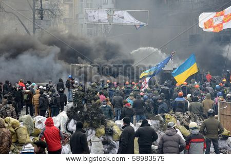 KIEV, UKRAINE - JANUARY 23, 2014: Anti-government protest in Kiev,  Grushevsky str.  People defend barricades.