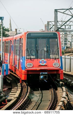 Dlr Train Arriving In Station London Uk