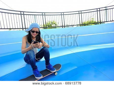 woman skateboarder at skatepark