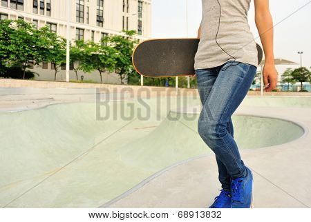 woman skateboarder at skatepark