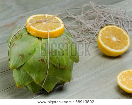 Artichoke With Vooking Twine And Lemon