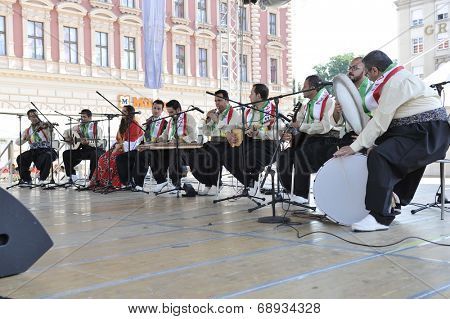 ZAGREB, CROATIA - JULY 18: Members of folk group Payiz from Sulaimaniya, Kurdistan, Iraq during the 48th International Folklore Festival in center of Zagreb, Croatia on July 18, 2014