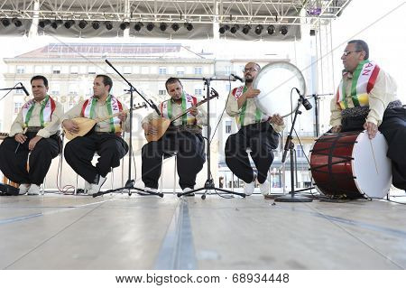 ZAGREB, CROATIA - JULY 18: Members of folk group Payiz from Sulaimaniya, Kurdistan, Iraq during the 48th International Folklore Festival in center of Zagreb, Croatia on July 18, 2014