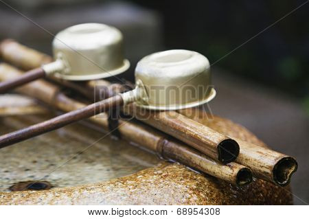 Japan, Nara, Kofuku-ji Temple, Row of ladles, close-up