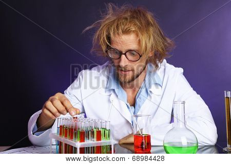 Crazy scientist working in laboratory