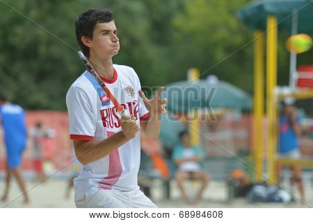 MOSCOW, RUSSIA - JULY 18, 2014: Nikita Burmakin of Russia in the match against Hungary during ITF Beach Tennis World Team Championship. Russia won 3-0