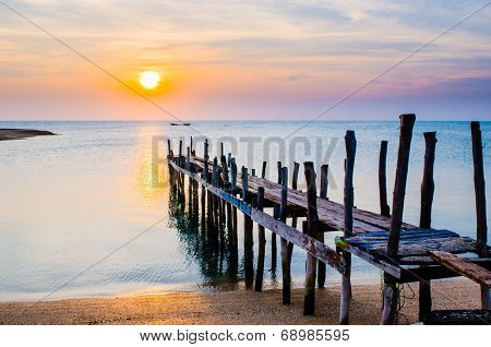 Sunset With Old Ruin Of Pier.