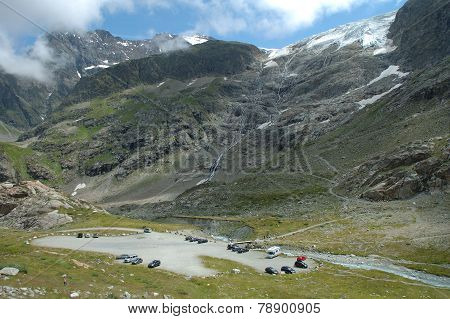 Parking In Valley And Glacier In Alps In Switzerland