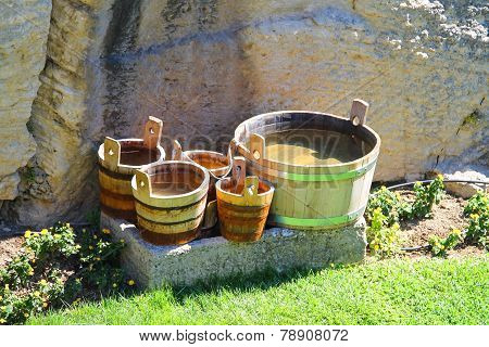 Wooden Buckets And Tubs In The Courtyard Of Fortresses Guaita On Mount Titan. The Republic Of San Ma