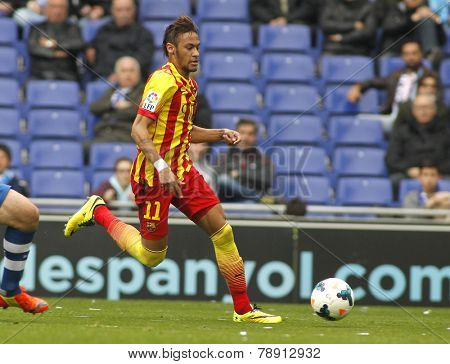 BARCELONA - MARCH, 29: Neymar da Silva of FC Barcelona in action during a Spanish League match against RCD Espanyol at the Estadi Cornella on March 29, 2014 in Barcelona, Spain