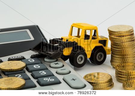 cost accounting in the construction industry and the construction industry. higher higher prices for road and residential construction. excavator with coins and calculator