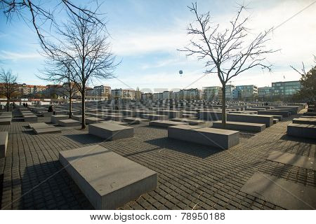 BERLIN, GERMANY - NOV 17, 2014: Memorial to the Murdered Jews of Europe, designed by architect Peter Eisenman and engineer Buro Happold, site 19,000 m2 covered with 2,711 concrete slabs. 