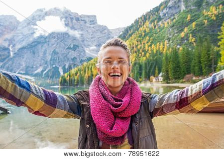 Happy Young Woman Making Selfie On Lake Braies In South Tyrol, I