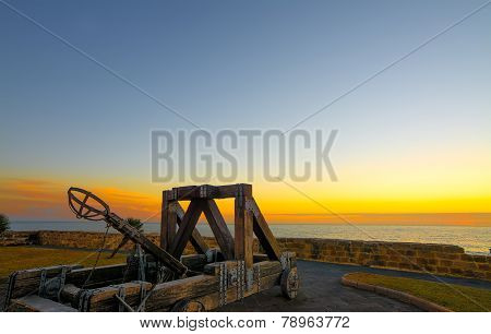 Antique Catapult By Alghero Promenade At Sunset