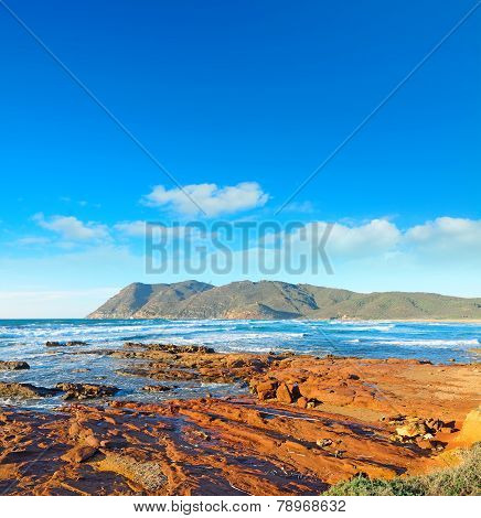 Red Rocks By The Shore In Porto Ferro