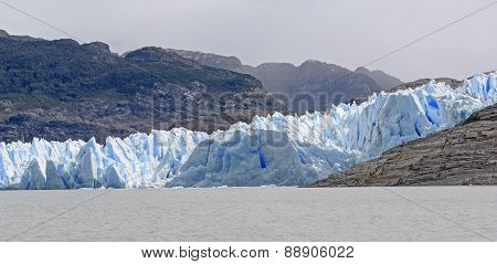 Blue Glacial Ice Meeting A Glacial Lake