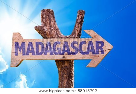 Madagascar wooden sign with sky background