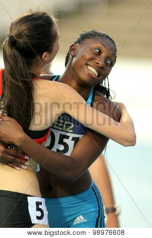 BARCELONA - JULY, 11: Anthonique Strachan of Bahamas celebrates gold of 100m event the 20th World Junior Athletics Championships at the Stadium on July 11, 2012 in Barcelona, Spain