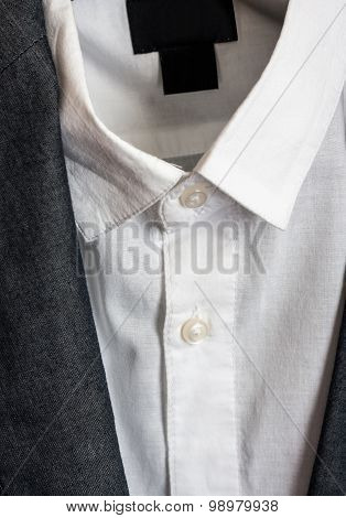 Shirt and jacket close up. Buttons and collar