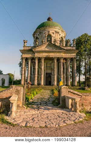 Baroque Roman Catholic church of St. Joseph in Pidhirtsi. Pidhirtsi village is located in Lviv province, Western Ukraine. Summer sunset light.