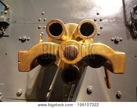 old military gun with grey metal and brass