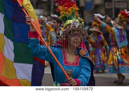 Santiago, Chile - August 5, 2017: Tinkus dance group parading through the centre of Santiago, Chile to mark Independence Day of Bolivia.