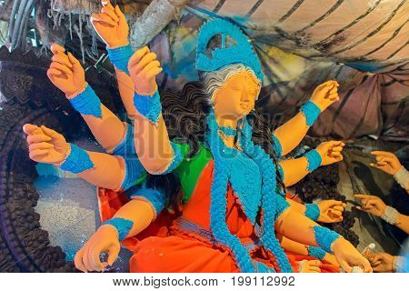 KOLKATA WEST BENGAL INDIA - 25 SEPTEMBER 2016: Clay idol of Goddess Durga under preparation for 