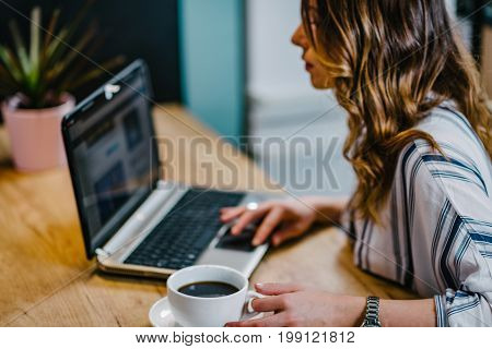 Young Woman Drinking Coffee And Working At Home, Color Image, One Woman Only