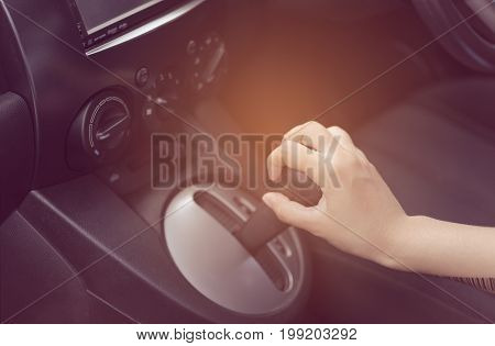 Woman Teenager Shifting The Gear Stick For Drive A Carretro Effect