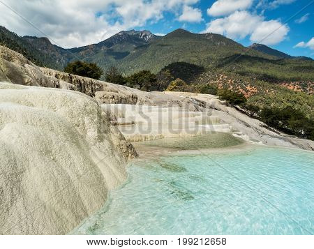 Baishuitai White Water Terraces travel destination near Zhongdian in Yunnan China