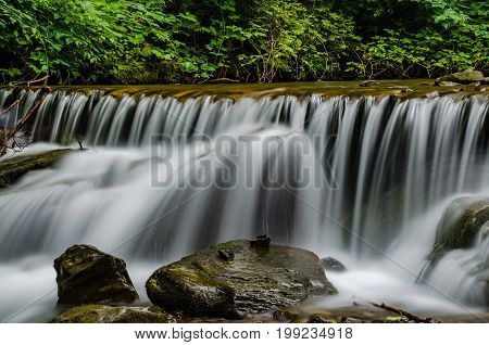 Landscape Of Waterfall Shypit In The Ukrainian Carpathian Mountains On The Long Exposure