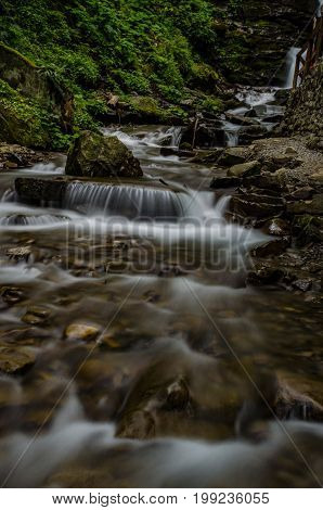 Landscape Of Waterfall Shypit In The Ukrainian Carpathian Mountains On The Long Exposure