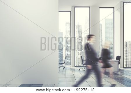 Business People In A White Office
