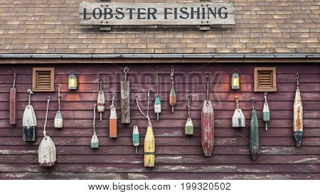 Closeup of colorful floats hanging outside a lobster fisherman's cottage.