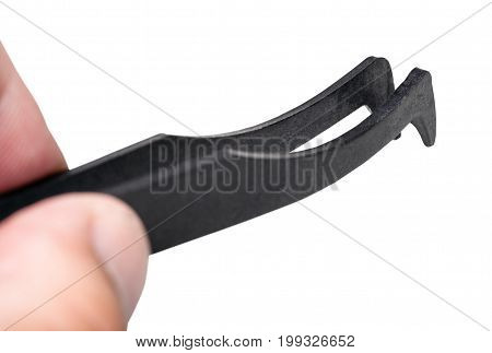 Fingers Hold Black Anti-static Tweezers Close Up
