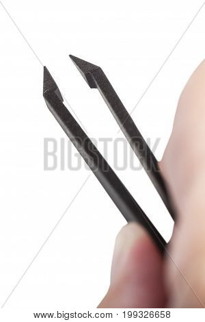 Above View Of Male Fingers Holding Black Tweezers